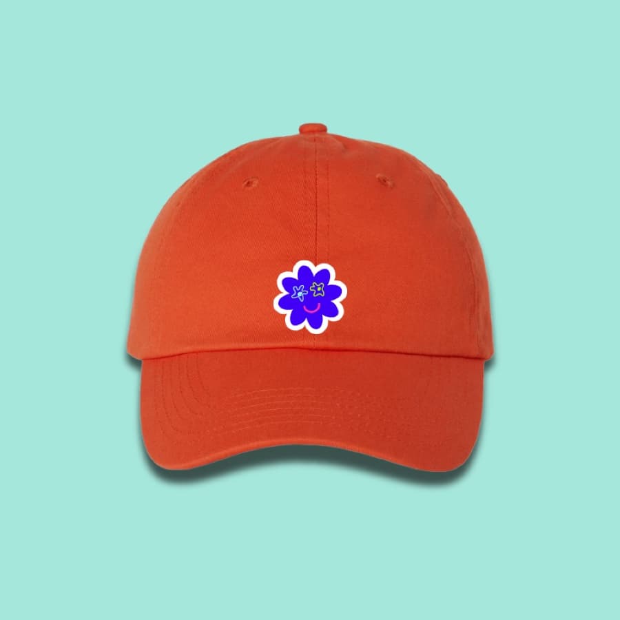 Orange cap with the Aloya flower patch